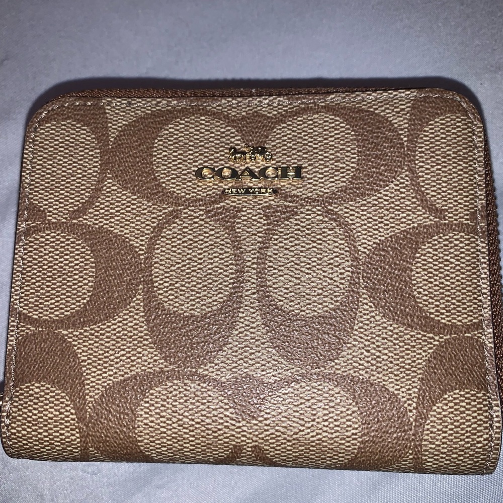 Small brown logo Coach wallet